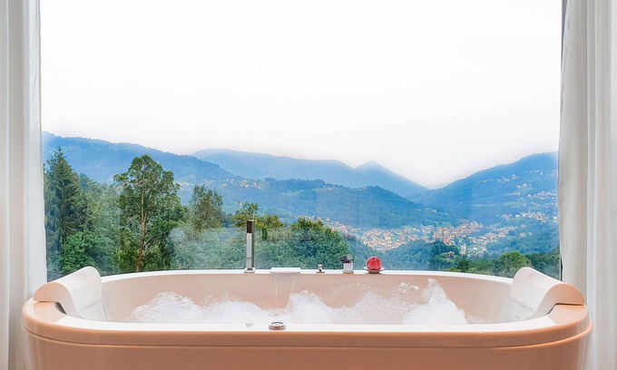 Rota d'Imagna Apartamento | Rota Apartments - bilocale NUVOLA con jacuzzi in camera e vista mozzafiato