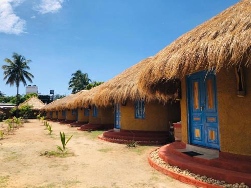 Pottuvil Division 2 Hotel | Rustic Cabanas & Restaurant