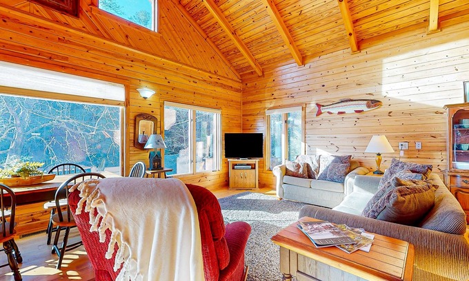 Clayton Cabina | Rustic two-story lakefront cabin near beach with dock, lake & mtn views, & deck