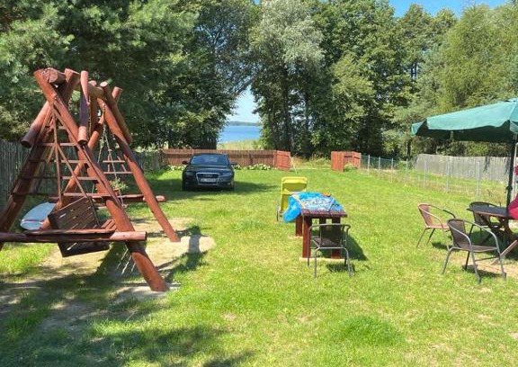 Glodowo Casa | Słońce i Woda - 2 domki nad brzegiem jeziora Śniardwy z własnym pomostem, zejściem do wody i przecudnym widokiem na jezioro