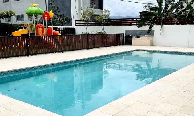 Gregorio Luperon Condominio | Safe & Charming private 3-bedroom condo with pool, WiFi, fitness room