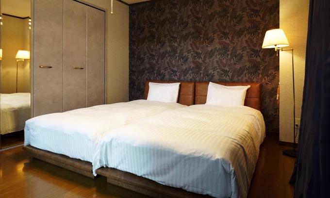 Shin-yashiki-cho Apartamento | SakuraPiso Twin Bedroom Non-Smoking Deluxe No.302 A stay-cation hotel in the center of Kagoshima City, ideal for business and sightseeing.
