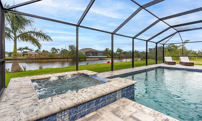 Burnt Store Casa | Salt water pool home with hot tub on fresh water canal and 40 foot pier 🌴