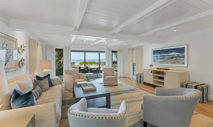 Cherokee Park Casa | Sarasota Renovated Waterfront Home with Dock Wide Open Bay Views Heated Pool