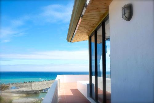 Eluan Cama Y Desayuno | Sea Shore Hotel