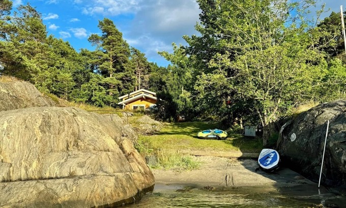 Kragero Cabina | Seaside cabin with boat and beach in Kragerø