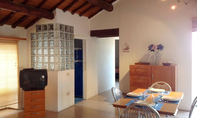 Santa Teresa di Gallura Apartamento | Seaview cozy penthouse 300m walk to the beach, large terrace. Center Village.