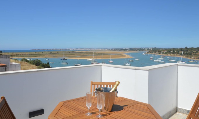 Alvor Casa | Seaview Townhouse by the riverside in the centre of Alvor (with terrace)