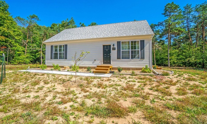 Honor Cabaña | Secluded & contemporary cottage with a washer/dryer, central AC, & firepit