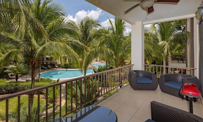 Coco Condominio | Second Floor Breezes - Beach Club Access - Terrace w/Grill - Walk to Shops & Restaurants
