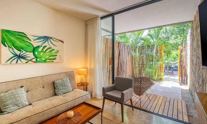 La Veleta Apartamento | Serene, ground-floor getaway with private & shared pool, washer/dryer, & patio