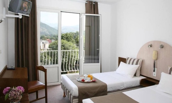Lourdes Hotel | Serene & Spacious Unit with Balcony, Free Parking, Onsite Restaurant!
