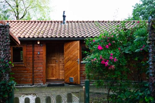 Epe Casa | Sfeervol houten huisje met omheinde tuin op de Veluwe