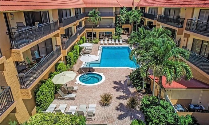 Holmes Beach Condominio | Playa Encantada, pasos de la playa