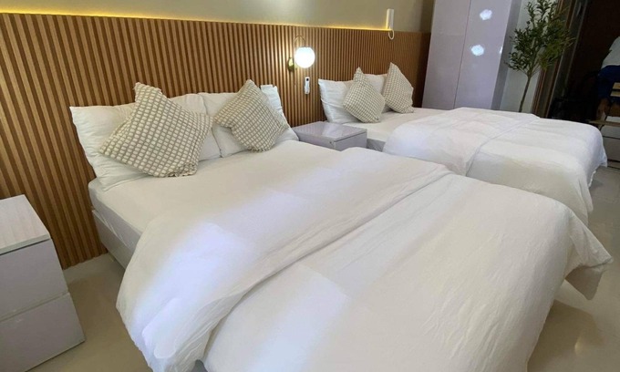 Barangay 76 Condominio | Shore 3 Residences Authentic Japanese-Style Bedroom with Pool View - MOA Complex
