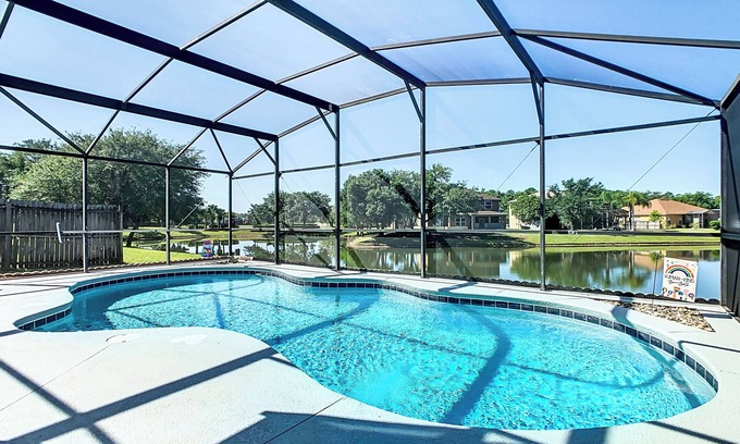 Crescent Lakes Casa | Smiling Disney Oasis heated pool home in Kissimmee with Game room.