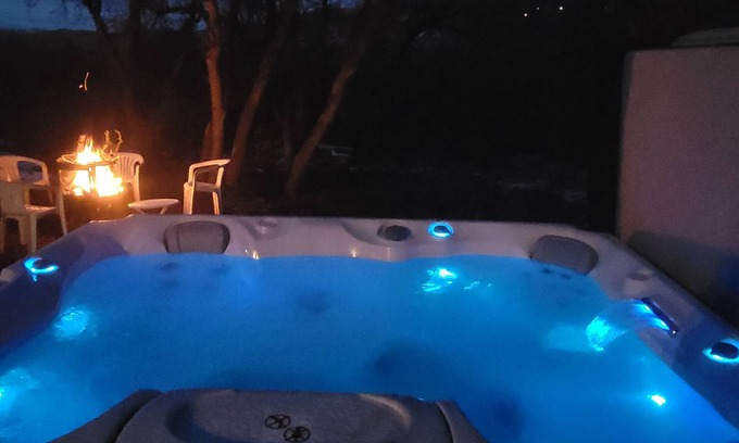 Collbran Cabina | Soak in some summer fun, Hot tub, hiking, biking, sxs adventures, and much more!
