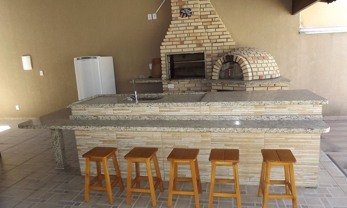Jardim California Casa | SOBRADO CON 03 HABITACIONES Y PISCINA CENTRO DE CARAGUATATUBA JUNTO A LA BOLA DE EVENTOS