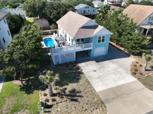 Colington Casa | Somewhere On A Beach - 4 bedroom -Private Pool - Hot Tub - Fire Pit - Game Room - Horseshoe Pits - Walk to beach, Sound, arcade and go carts!