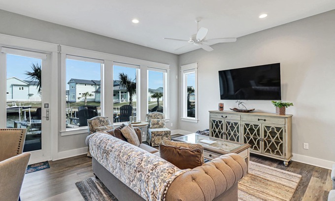 Rockport Casa | Sophisticated canal-view villa with pool, vast fishing pier, deck & washer/dryer