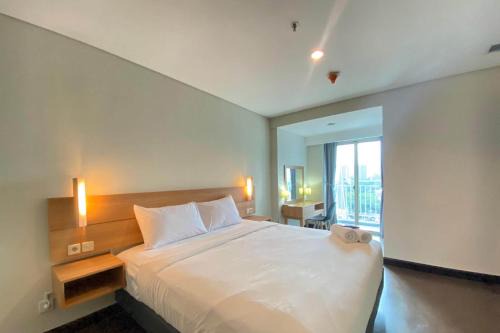 Braga Apartamento | Spacious 2BR Apartment at El Royale near BIP By Travelio