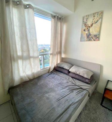 Dona Imelda Apartamento | Spacious 2br condo at Quezon City Mezza Residences 1
