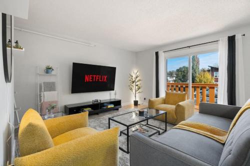 Montgomery Casa | Spacious 4-Bedroom Retreat Near Bow River with Foosball, Dart Board, Movie Room