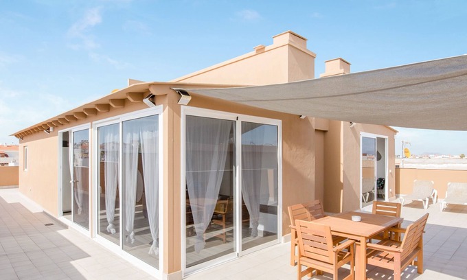 Corralejo Apartamento | Amplio apartamento "Ático deluxe Corralejo centro" Cerca de la playa con vistas al mar
