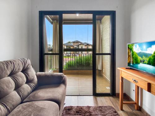 Campos do Jordao Apartamento | Spacious Balcony 2 bedrooms Heater