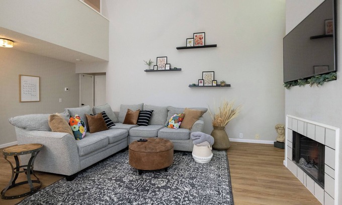 Denton Casa | Backyard with hammock, fire pit, grill, dining table, and plenty of seating!