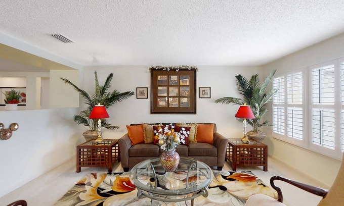 Westside Casa | Spacious home with sunroom, patio, fireplace, & water views