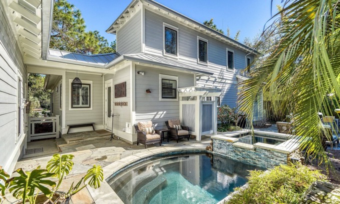 Sugarwood Beach Casa | Spacious Layout with Heated Pool, Fire Pit, Golf Cart, Bikes, and Carriage House