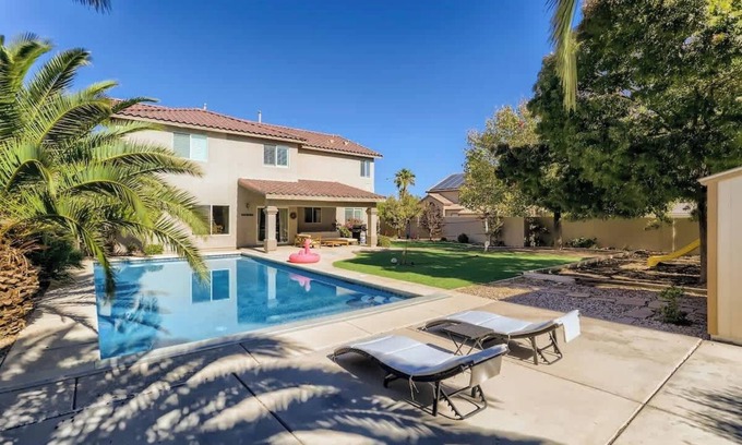 Rhodes Ranch Casa | Spacious Luxury Desert Retreat with Heated Pool, Putt putt and a playground for