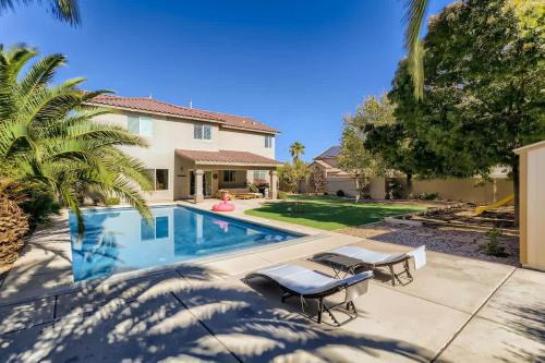 Rhodes Ranch Casa | Spacious Luxury Desert Retreat with Heated Pool Putt putt and a playground for family