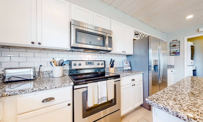Isla Del Sol Casa | Spacious upgraded coastal getaway with firepit - near boat ramp, stroll to beach