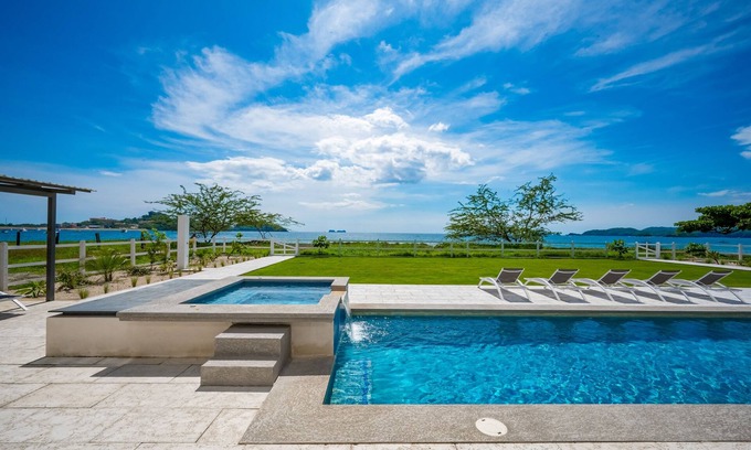Potrero Apartamento | Spacious waterfront condo with shared pool, balcony, and washer/dryer
