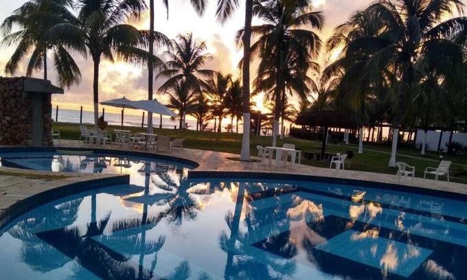 Olivenca Apartamento | Pase sus vacaciones frente a una playa privada con un área de recreación exuberante