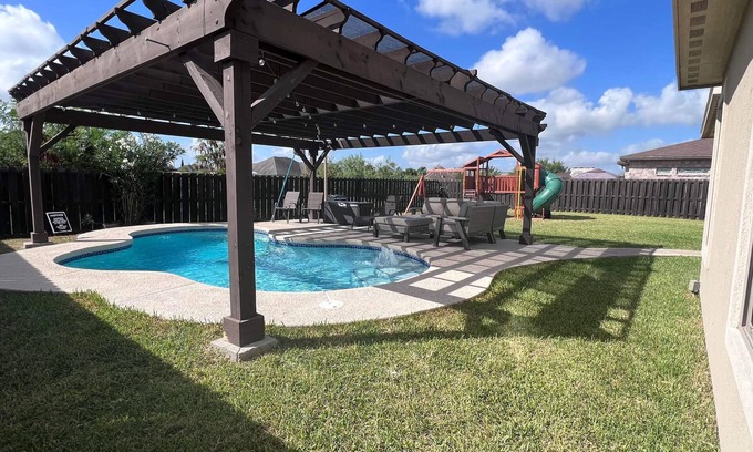 Brownsville Casa | Stately retreat with backyard oasis - pool, inviting patio - plus modern kitchen