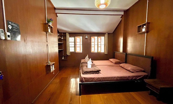 Chang Phueak Casa | Stay in Style: Cozy AC Room, Tropical Garden & Prime Location.