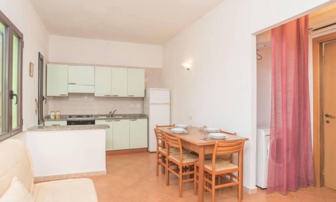 Costa Rei Apartamento | Stella con piscina comune (REI100) by Interhome