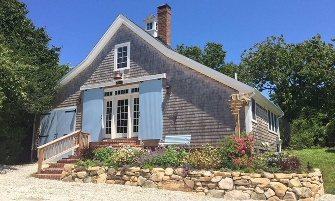 Chatham Casa | Step back in time in this beautifully maintained antique horse barn cottage!!