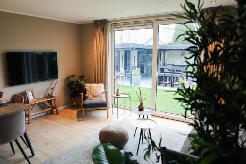 Baarland Chalet De Esquí | Stijlvol ingerichte bungalow aan de Westerschelde