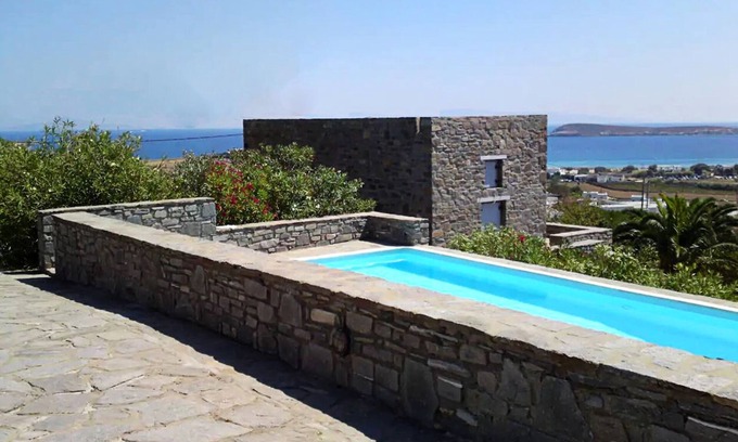 Chrissi Akti Casa | StoneHouse junto a la piscina