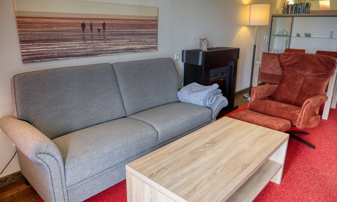 Wremen Apartamento | Strandnahe Ferienwohnung mit Sauna & Schönem, Überdachten Balkon mit Deichblick