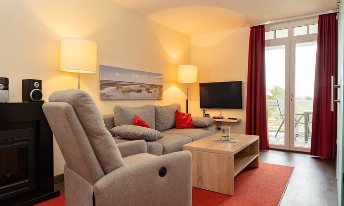 Wremen Apartamento | Strandnahe, Hübsche Wohnung mit Sauna und Balkon mit Blick zum Nordseedeich