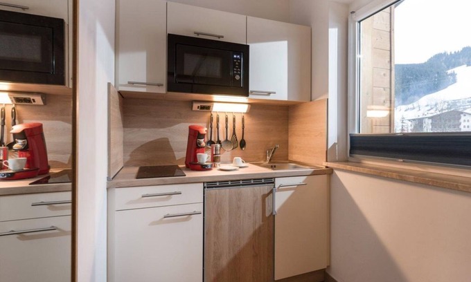 Scheffau am Wilden Kaiser Cama Y Desayuno | Studio apartment with kitchen, bathroom, balcony - Blaiken Appartements