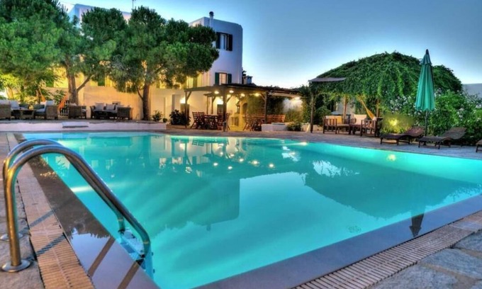 Chrissi Akti Apartamento | Studio Apartment "Tzane Balcony" with Sea View, Shared Pool & Wi-Fi