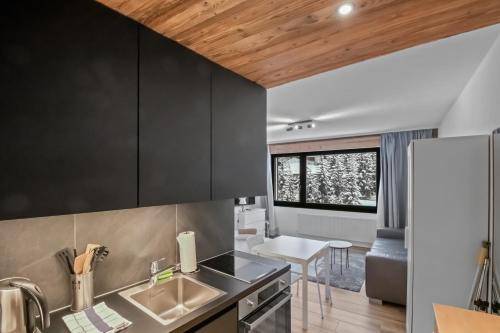 Lens Apartamento | Studio cosy au centre de Crans-Montana