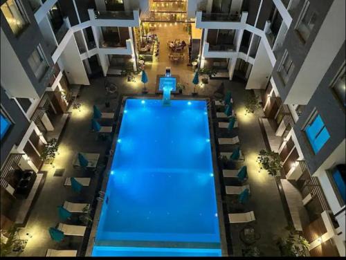 Al Ahyaa Apartamento | Studio Imperial resort pool view