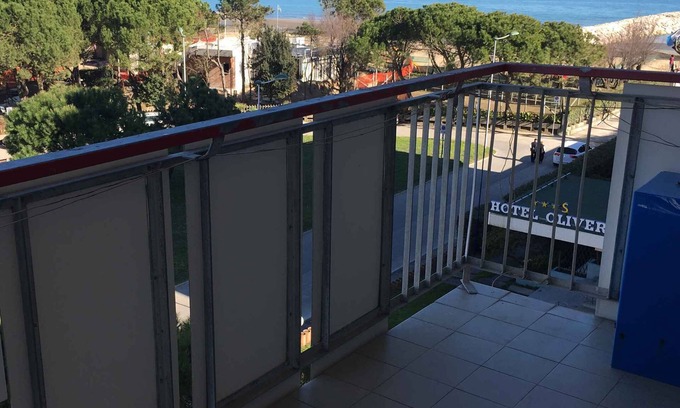 Porto Santa Margherita Apartamento | Apartamento vacacional con vista al mar y aire acondicionado